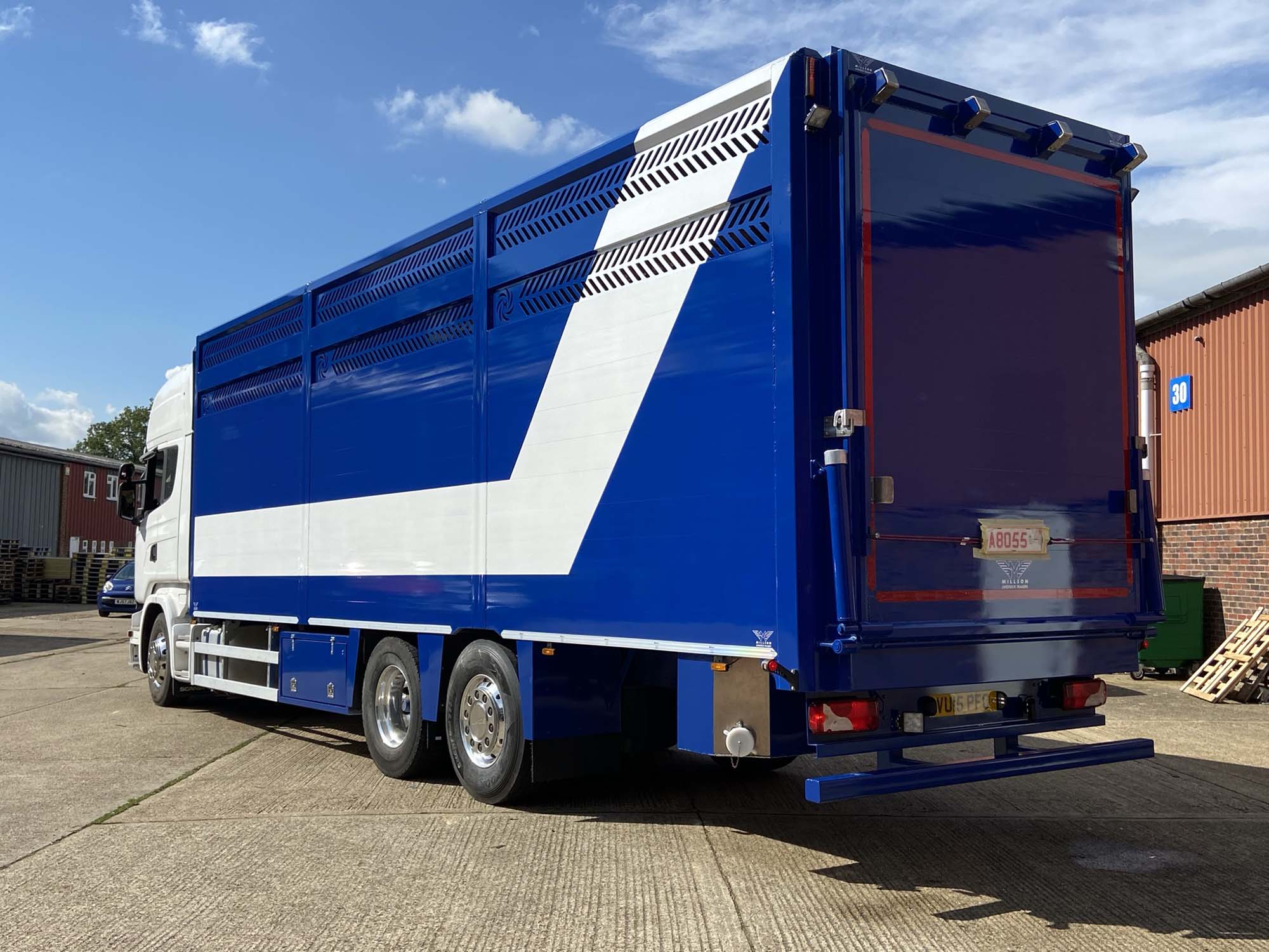 Blue and white single Deck Cattle trailer in Sussex loader closed