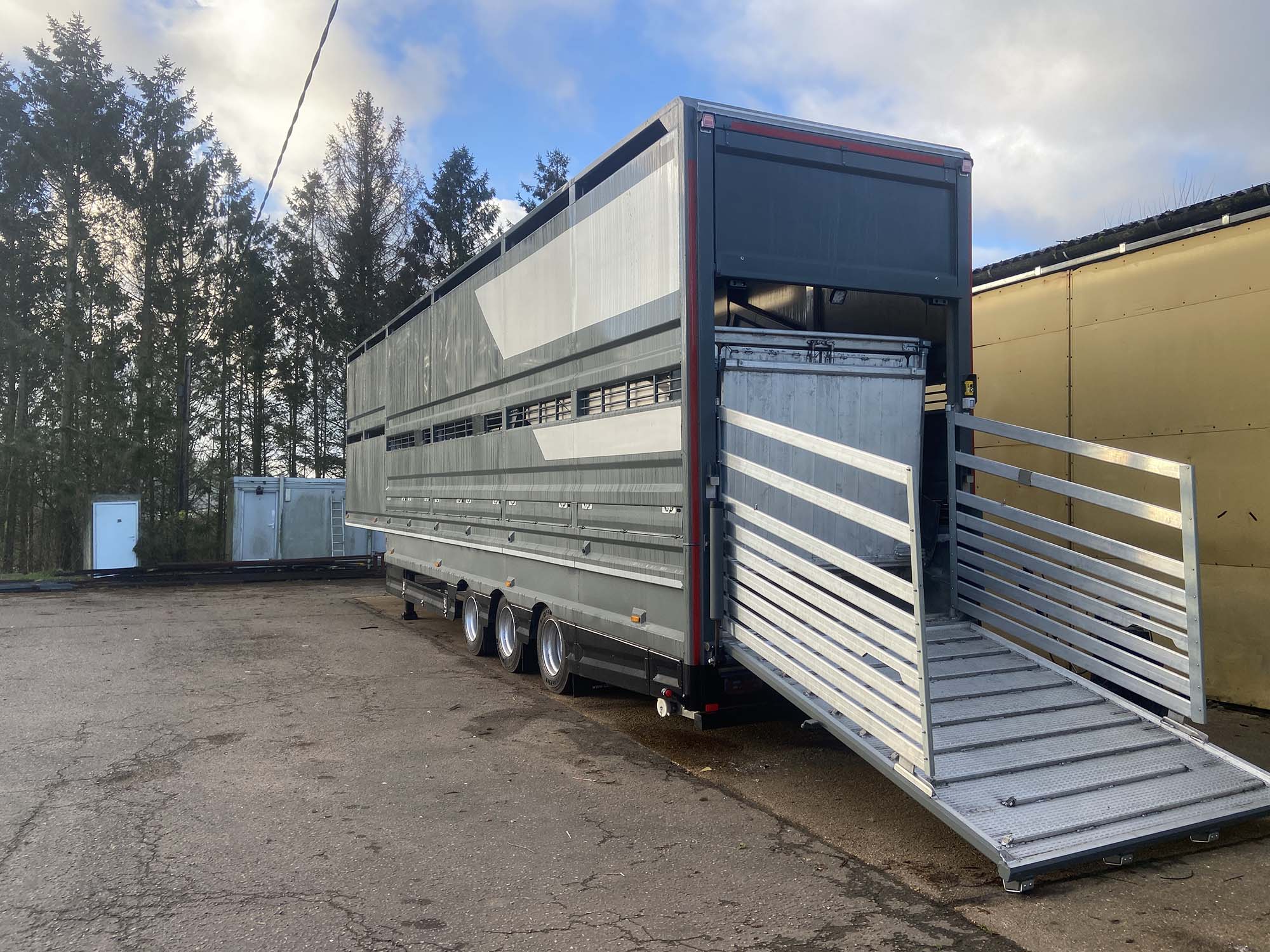 Grey and silver Semi Trailer in Sussex with back end open