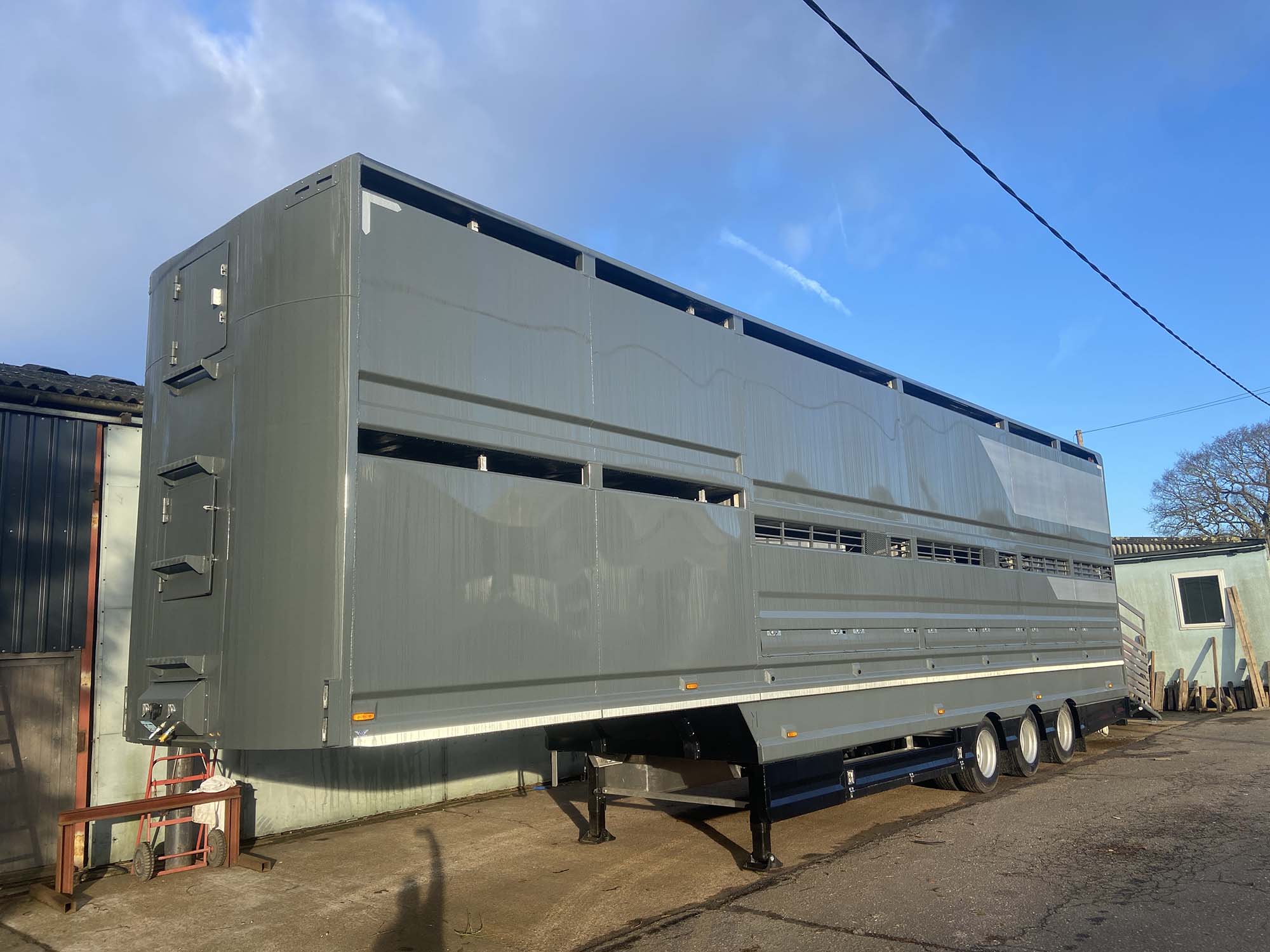 Side view of grey and silver Semi Trailer in Sussex