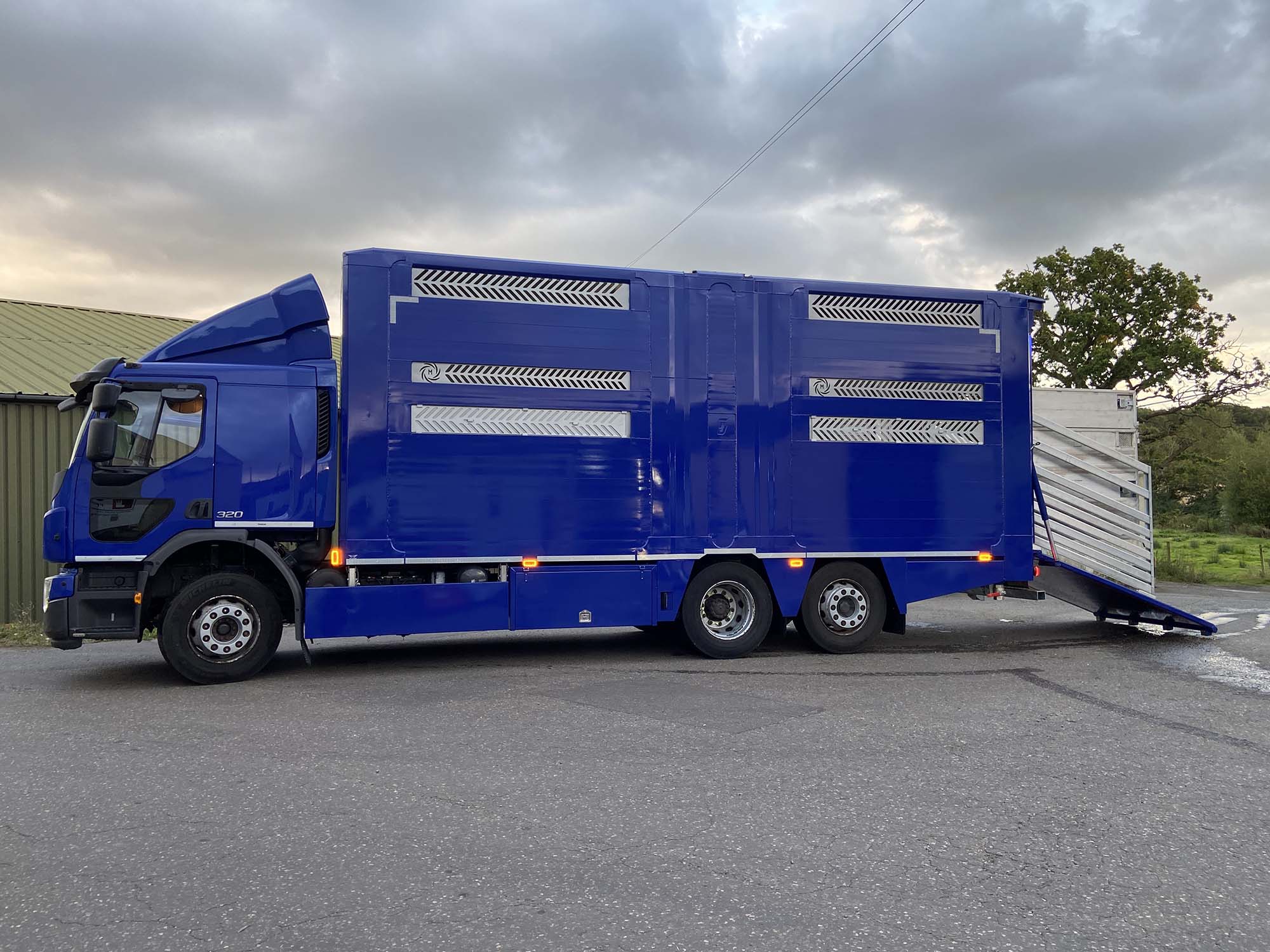 Side view of blue Lift Shaft Body Livestock Container in Sussex